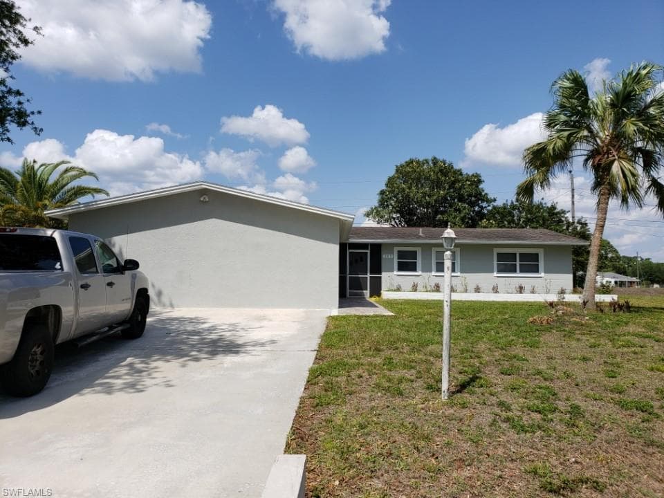 203 Jasmine RD LEHIGH ACRES, FL 33936
