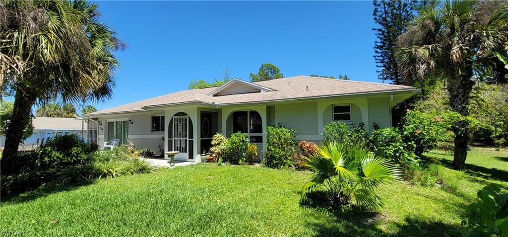 706 Henry AVE LEHIGH ACRES, FL 33972