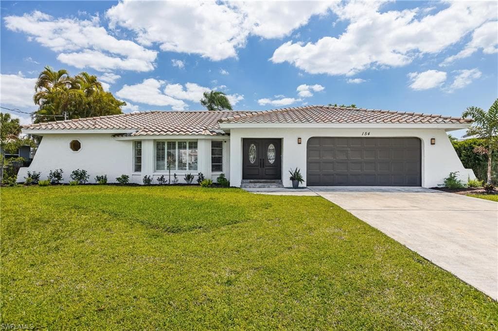 154 SW 52nd ST CAPE CORAL, FL 33914