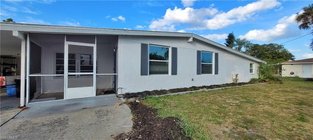 1003 E Jasmine RD LEHIGH ACRES, FL 33936