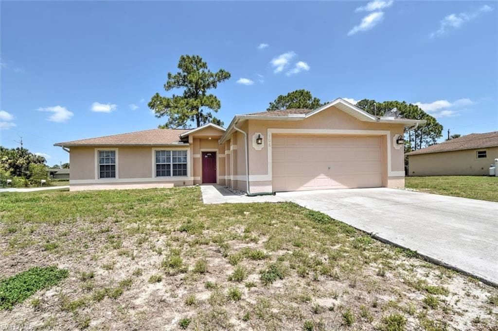 106 W 5th ST LEHIGH ACRES, FL 33972
