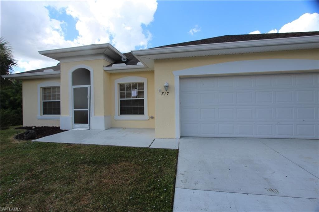 717 Spaulding ST E LEHIGH ACRES, FL 33974