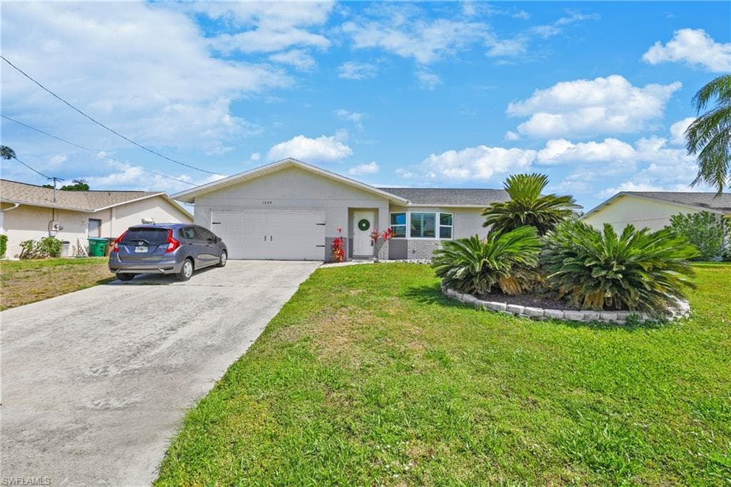 1405 SE 32nd ST CAPE CORAL, FL 33904