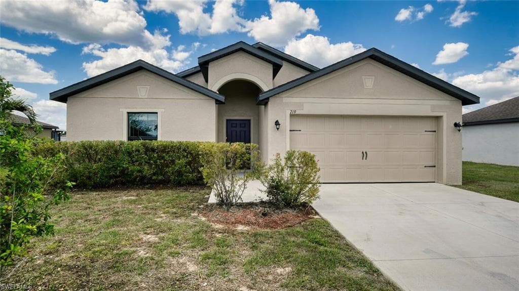 719 Center Lake ST LEHIGH ACRES, FL 33974