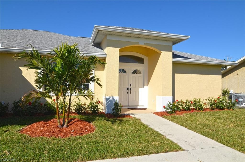 911 SE 21st LN CAPE CORAL, FL 33990
