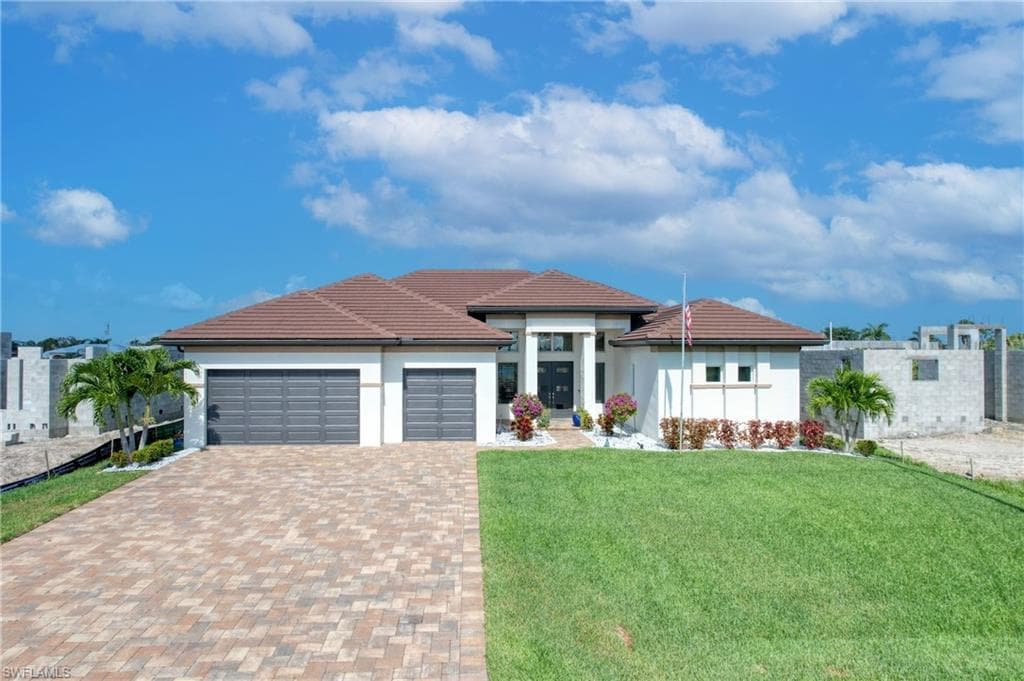 1034 NW 38th PL CAPE CORAL, FL 33993