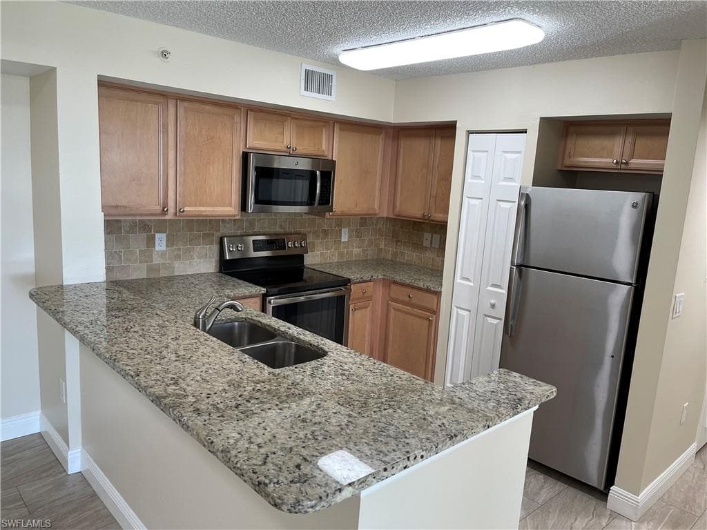 1210 Wildwood Lakes BLVD 104 NAPLES, FL 34104