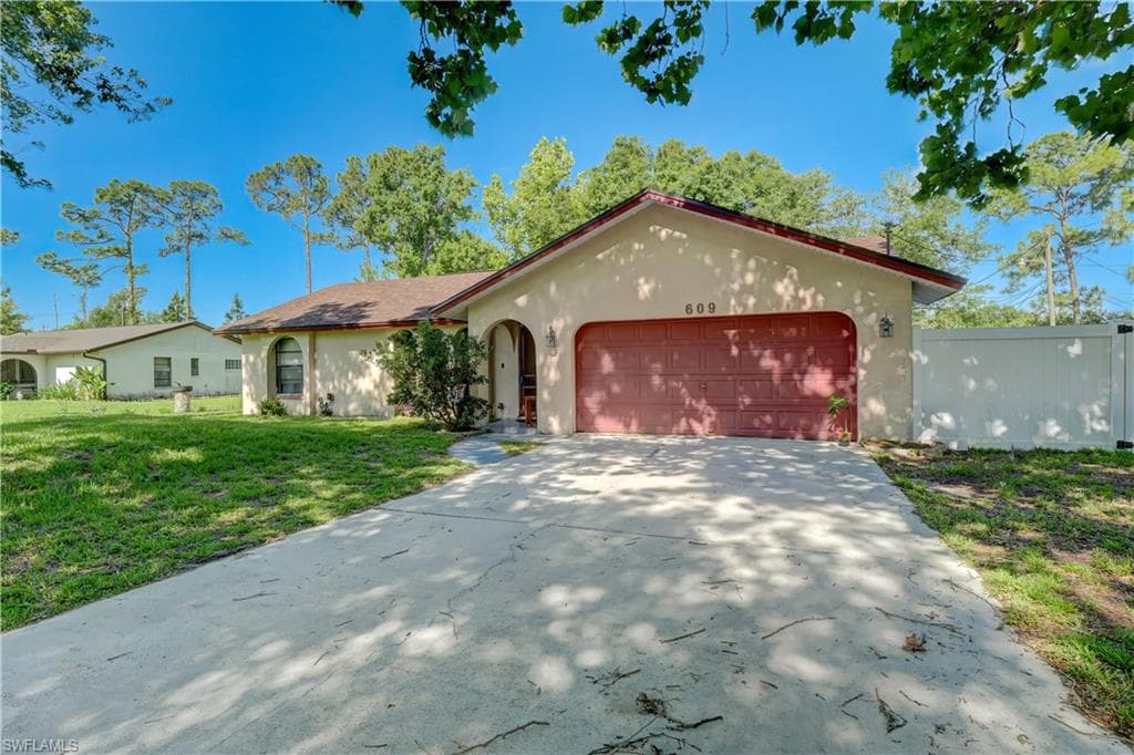 609 Greenwood AVE LEHIGH ACRES, FL 33972