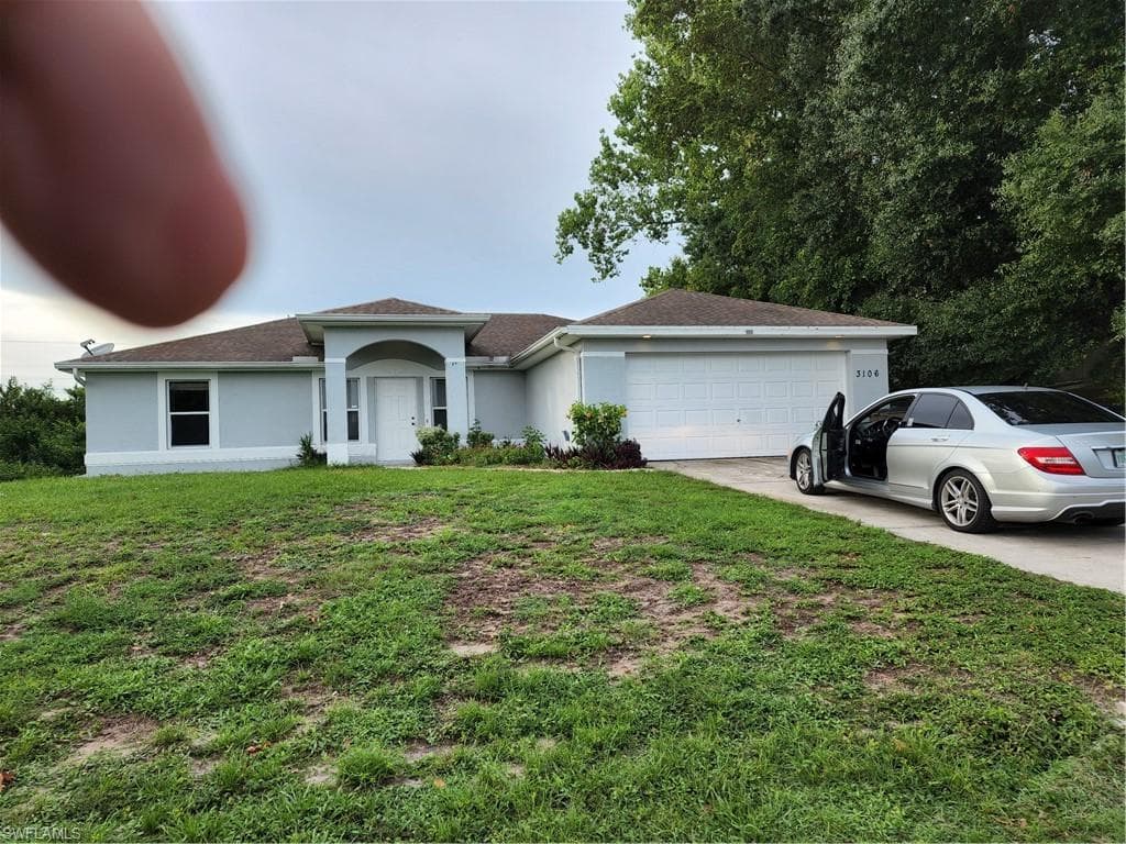 3106 2nd ST SW LEHIGH ACRES, FL 33976