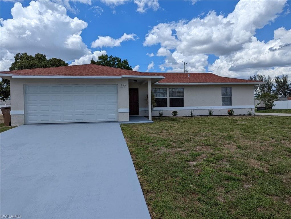 317 SE 14th TER CAPE CORAL, FL 33990