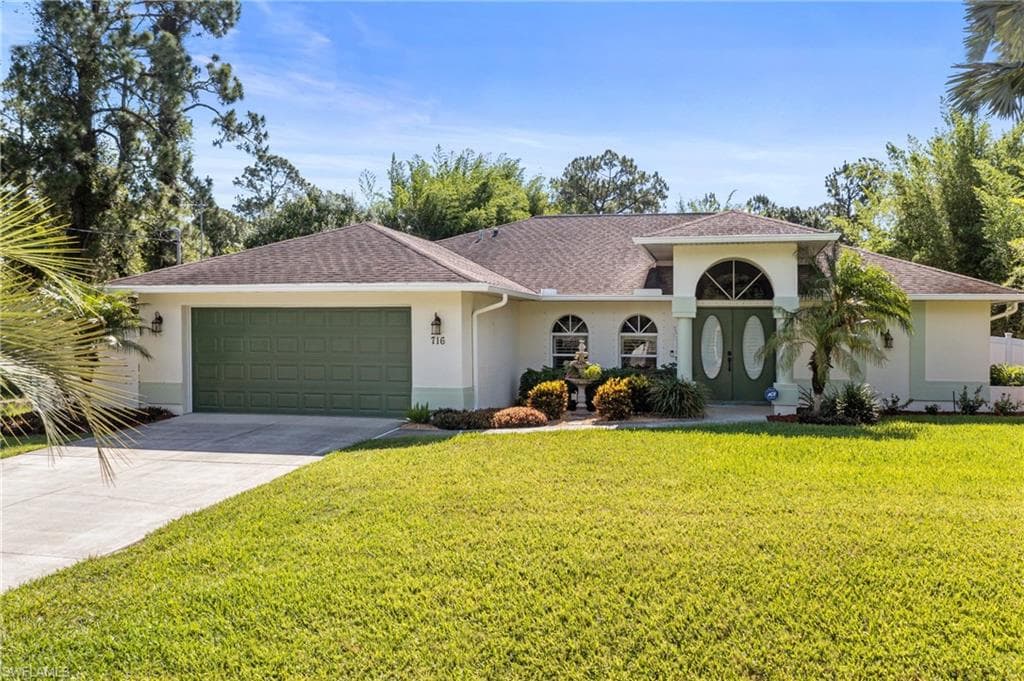 716 Grant AVE LEHIGH ACRES, FL 33972