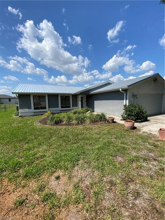 3414 22nd ST SW LEHIGH ACRES, FL 33976