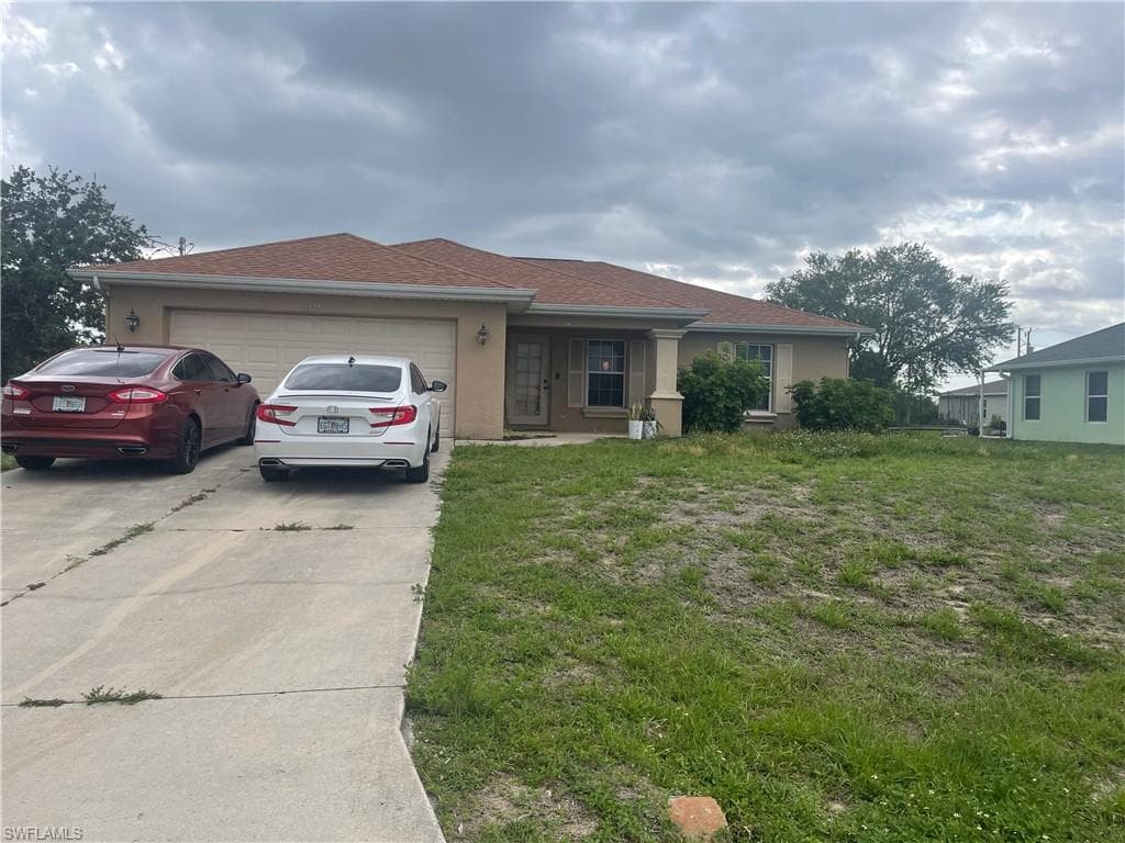 2428 NE 1st AVE CAPE CORAL, FL 33909