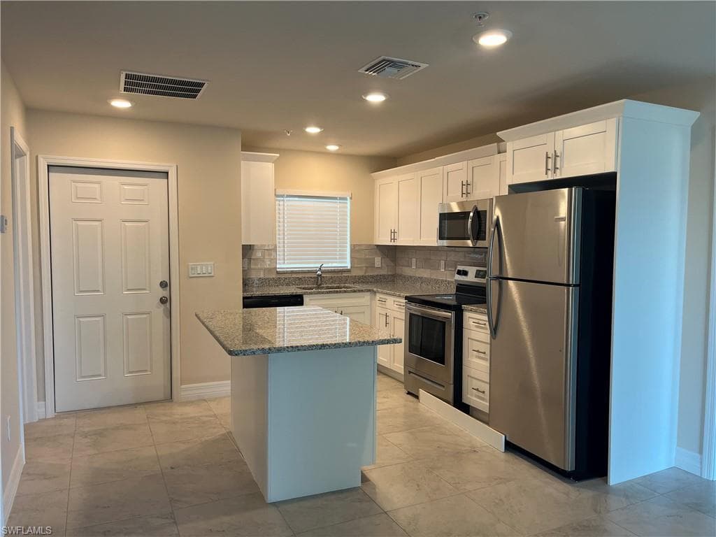 1625 SW 1st AVE CAPE CORAL, FL 33991