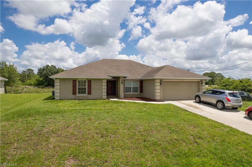817 Theodore Vail ST E LEHIGH ACRES, FL 33974