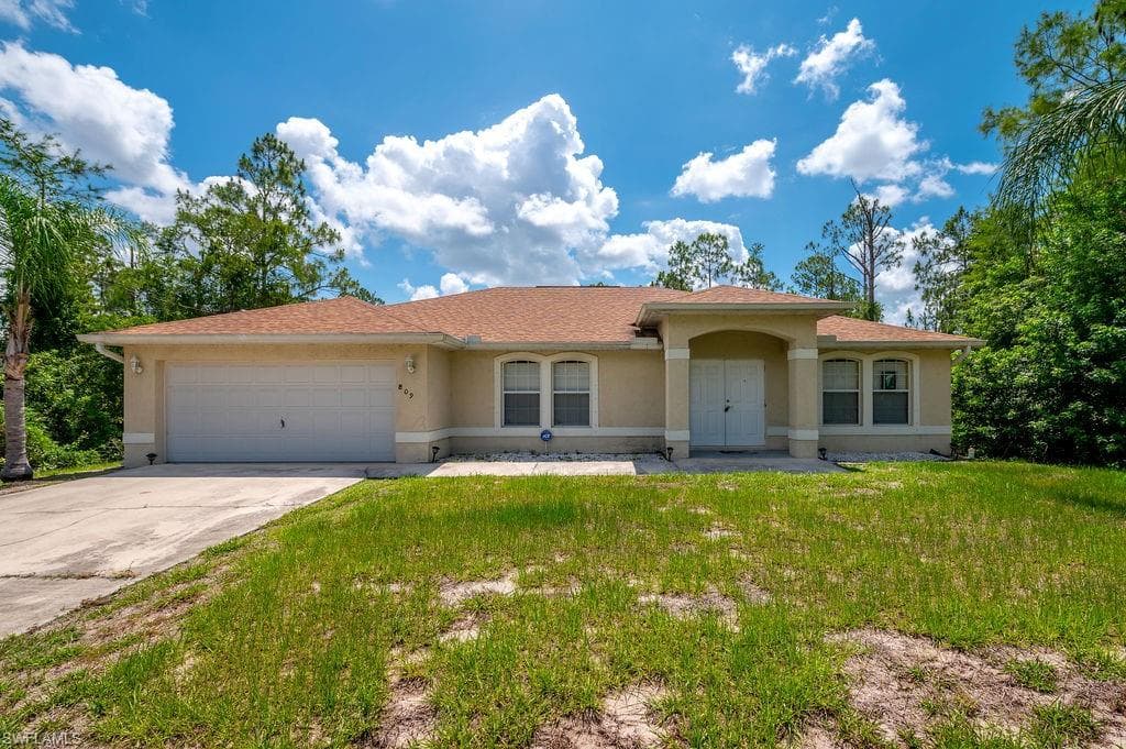 809 Gaylord AVE S LEHIGH ACRES, FL 33974