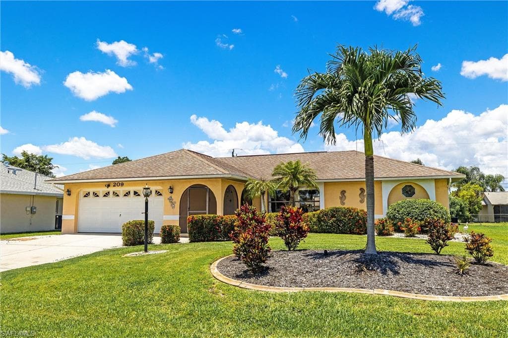 209 SW 32nd TER CAPE CORAL, FL 33914