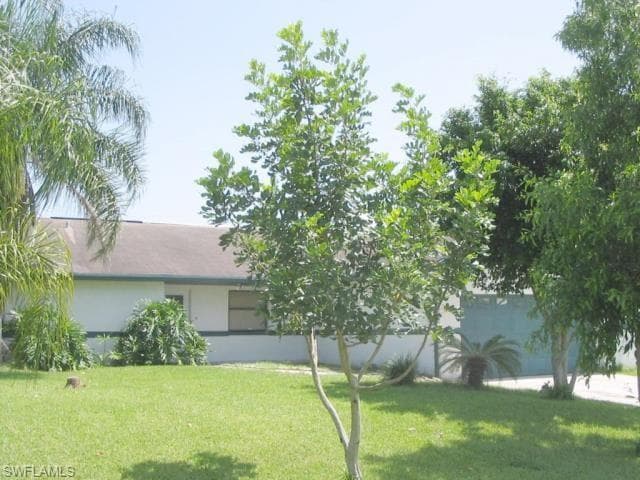 1203 NE 10th TER CAPE CORAL, FL 33909