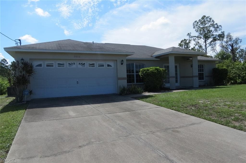 2004 Ann AVE N LEHIGH ACRES, FL 33971