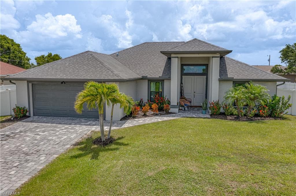 703 NW 19th CT CAPE CORAL, FL 33993