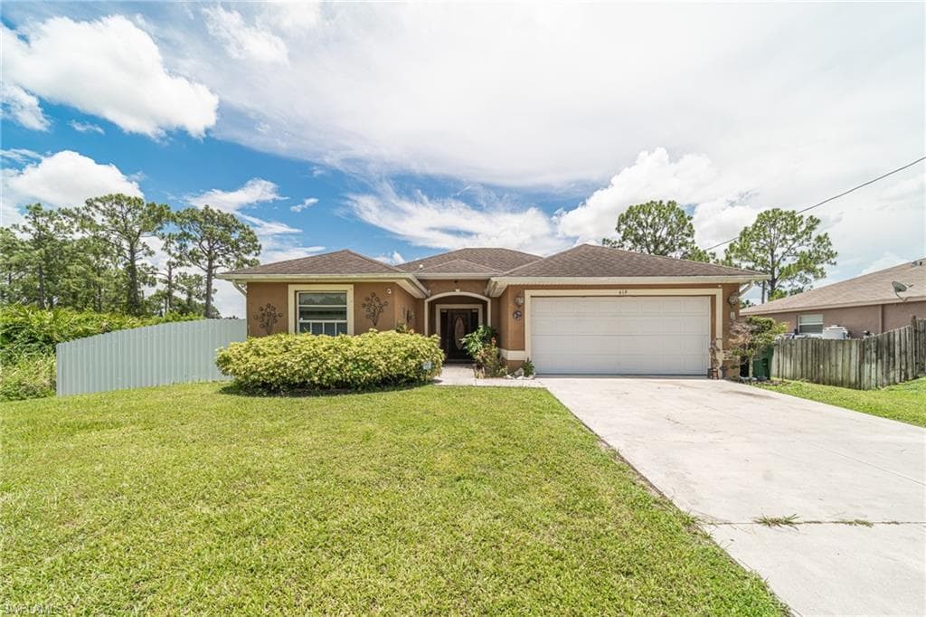 619 Eisenhower BLVD LEHIGH ACRES, FL 33974