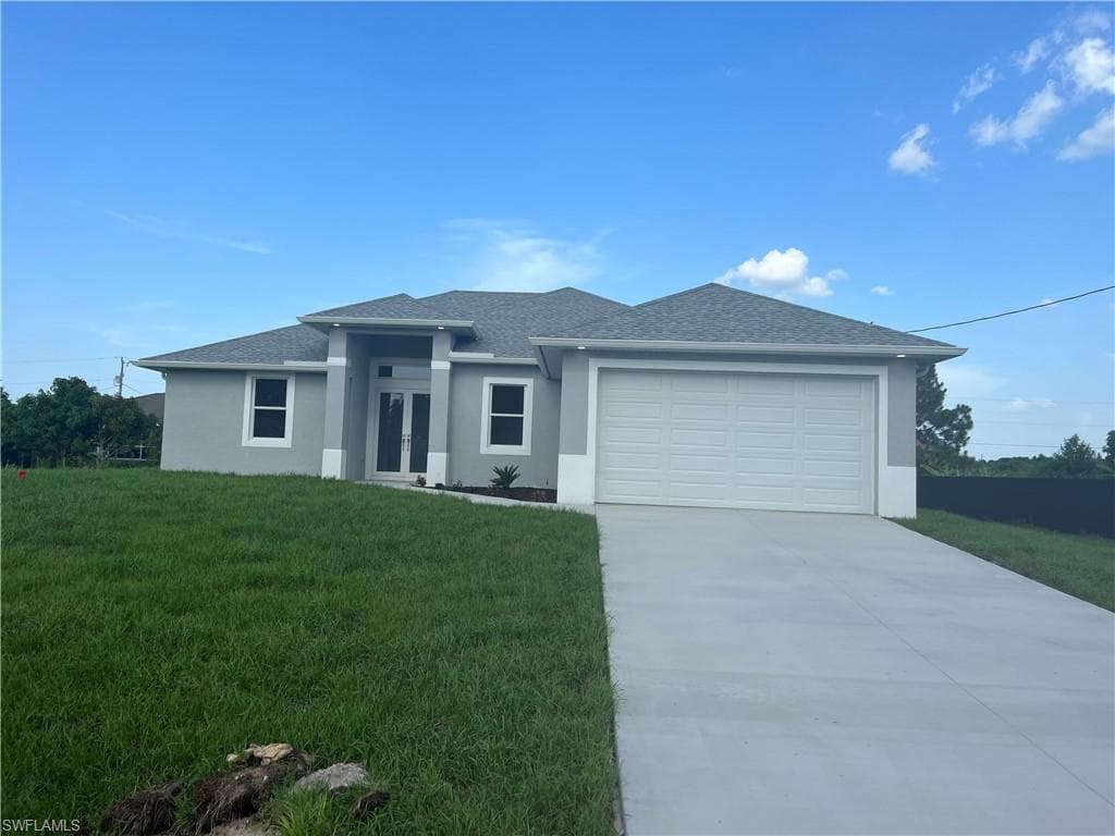 910 SALLY AVE N LEHIGH ACRES, FL 33971