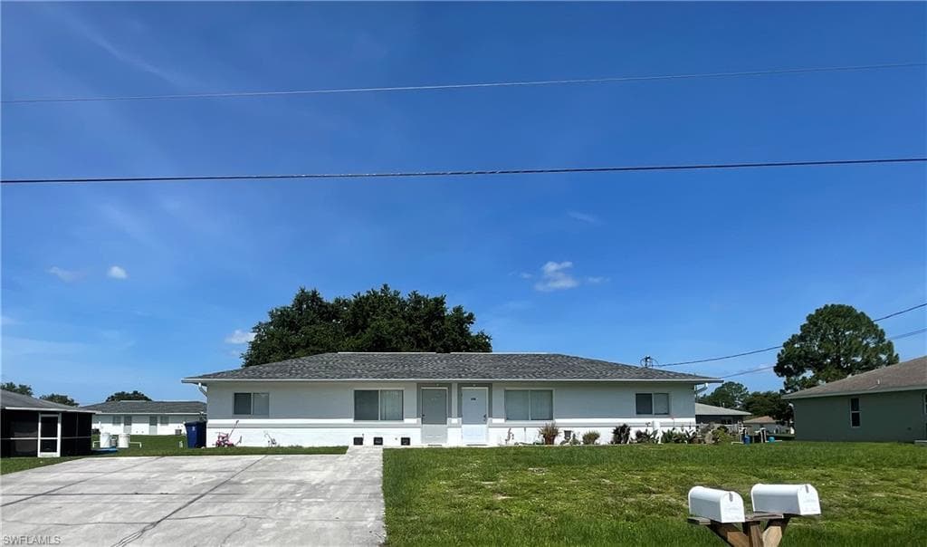 128/130 Gilbert AVE S LEHIGH ACRES, FL 33973