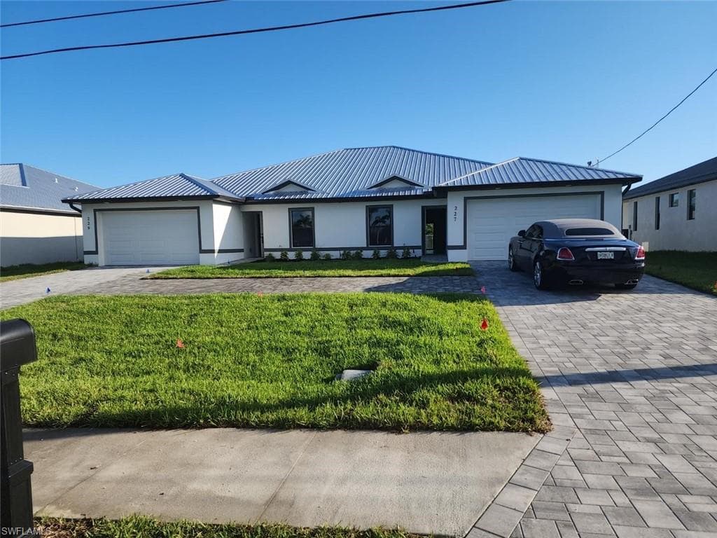 227/229 SW 47th TER CAPE CORAL, FL 33914