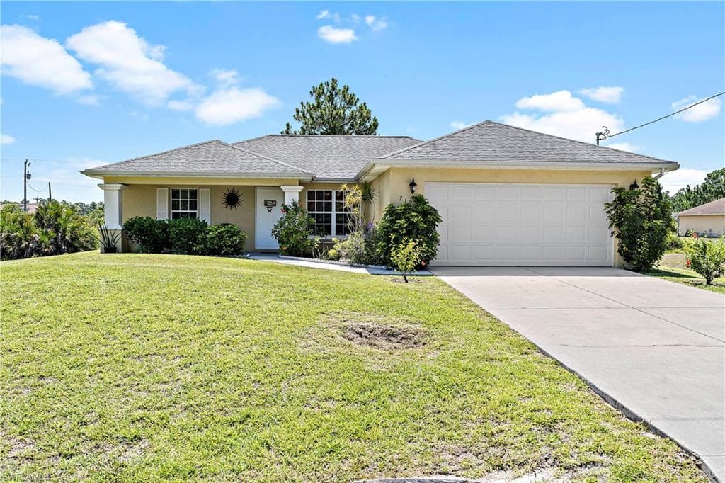 719 Peacock AVE LEHIGH ACRES, FL 33974