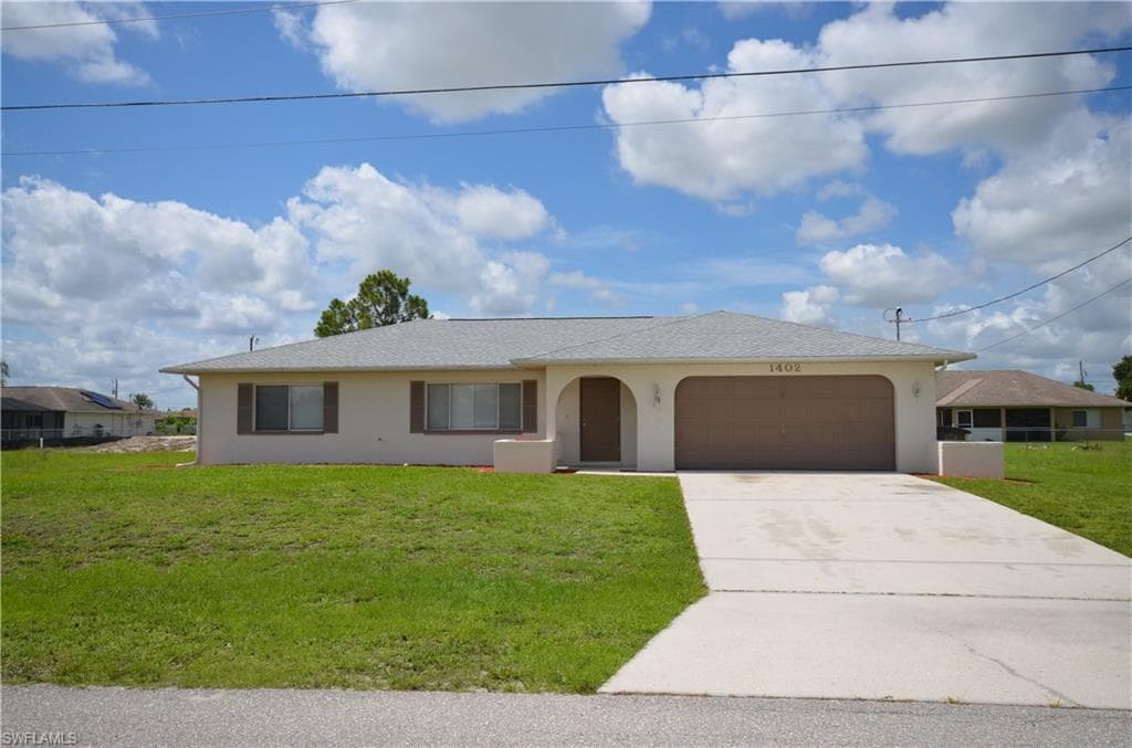 1402 NE 18th ST CAPE CORAL, FL 33909