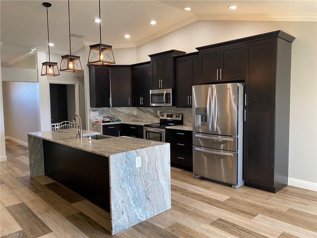 415 NW 23rd TER CAPE CORAL, FL 33993