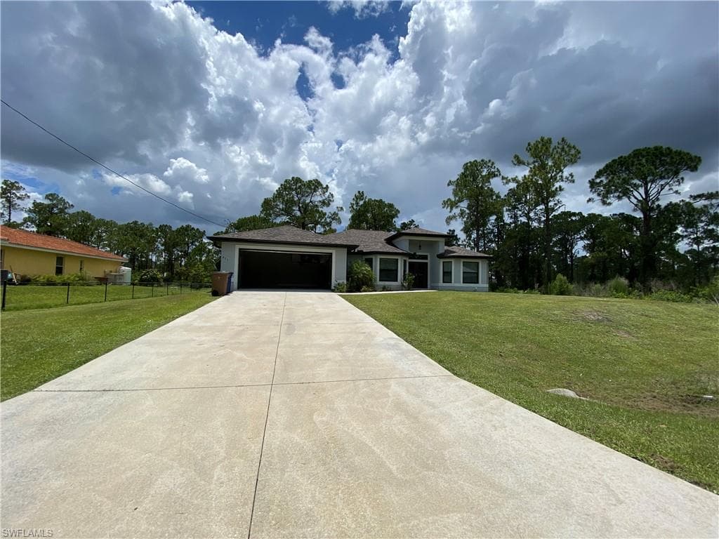 911 Magnolia AVE LEHIGH ACRES, FL 33972