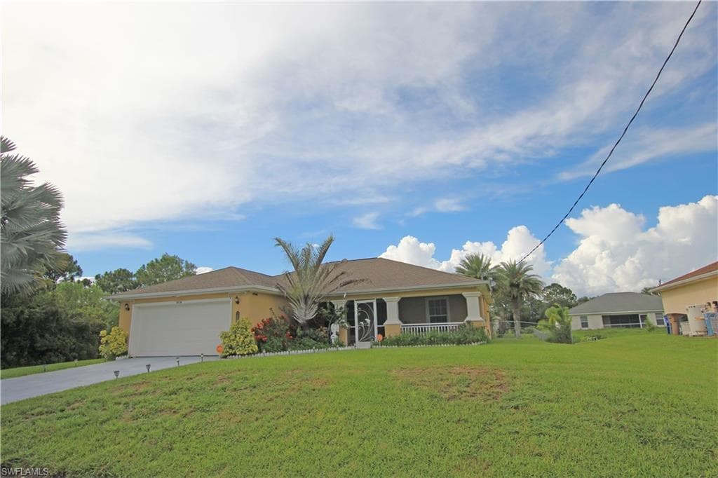 2614 55th ST W LEHIGH ACRES, FL 33971