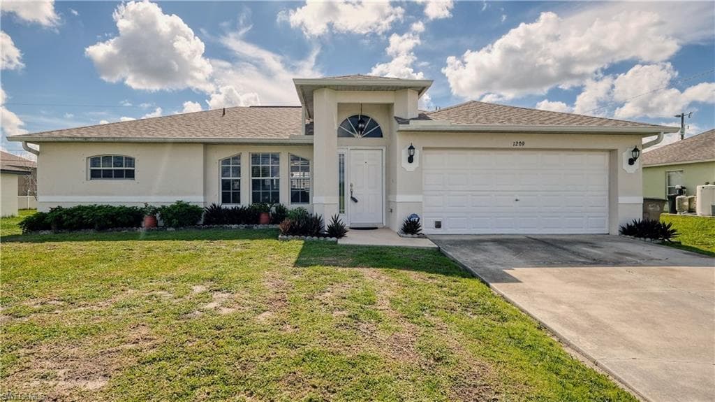1209 NE 4th AVE CAPE CORAL, FL 33909