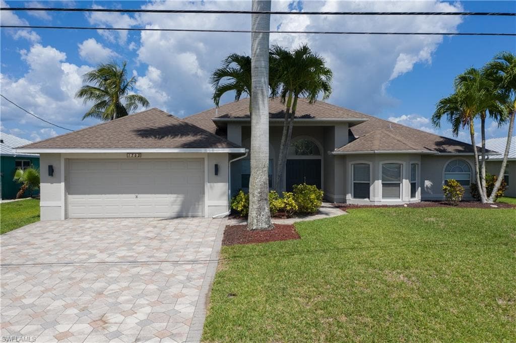 1703 SW 6th AVE CAPE CORAL, FL 33991