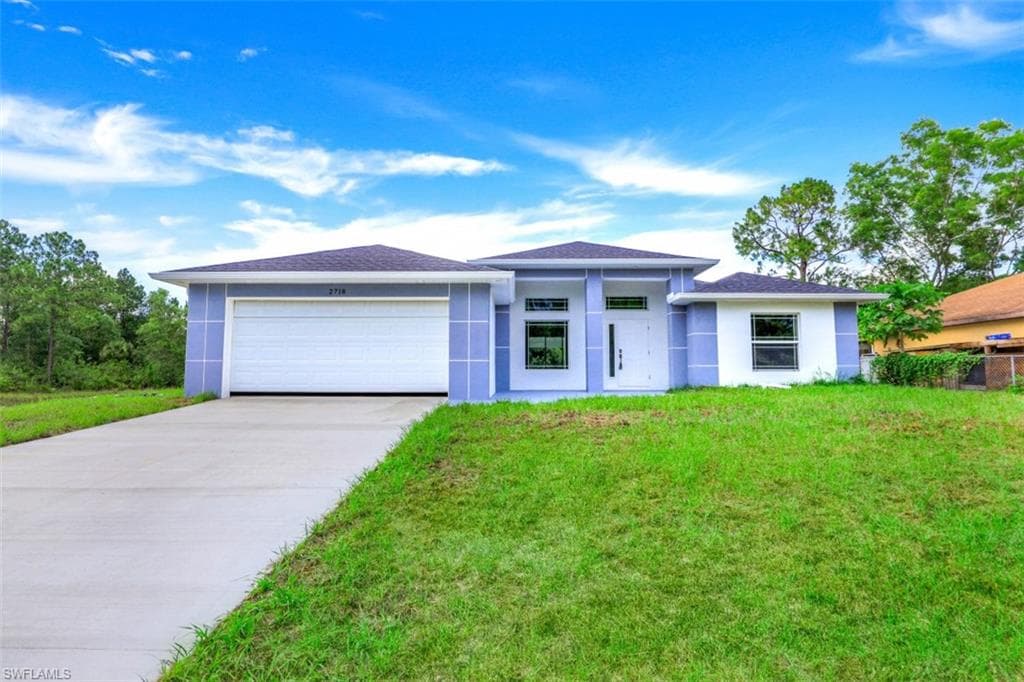 2718 11th ST W LEHIGH ACRES, FL 33971