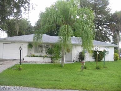 715 Willow DR LEHIGH ACRES, FL 33936