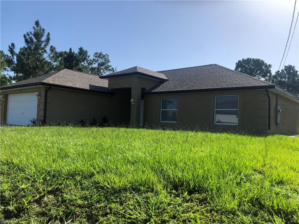 1804 Ann AVE N LEHIGH ACRES, FL 33971