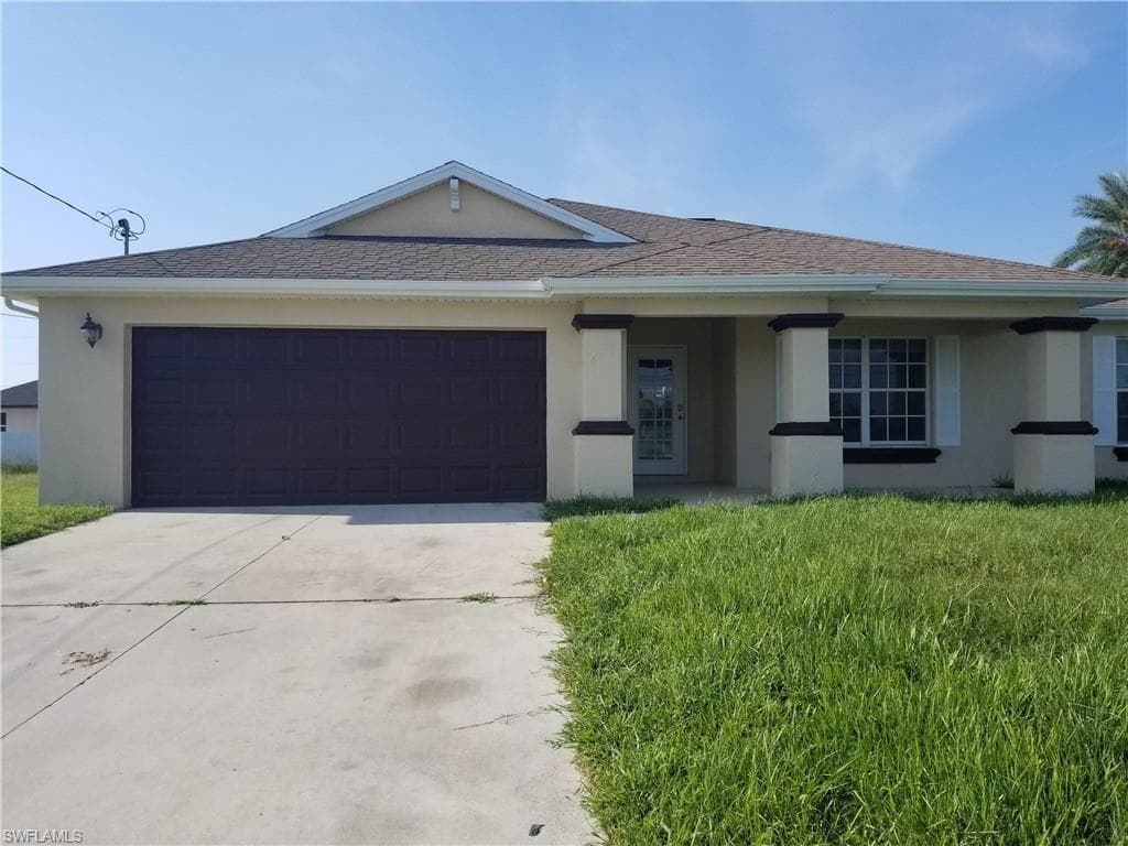 407 NW 9th ST CAPE CORAL, FL 33993