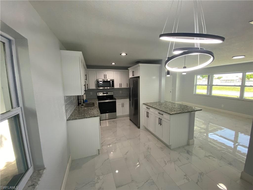 1327 SE 45th ST CAPE CORAL, FL 33904
