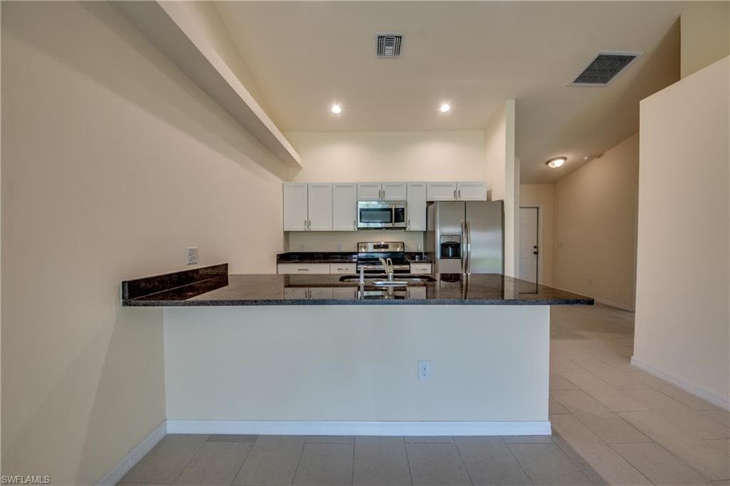 1633 SW 33rd ST CAPE CORAL, FL 33914