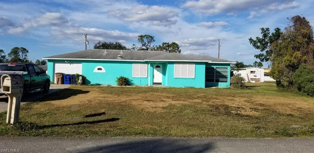 306 Lincoln BLVD LEHIGH ACRES, FL 33936