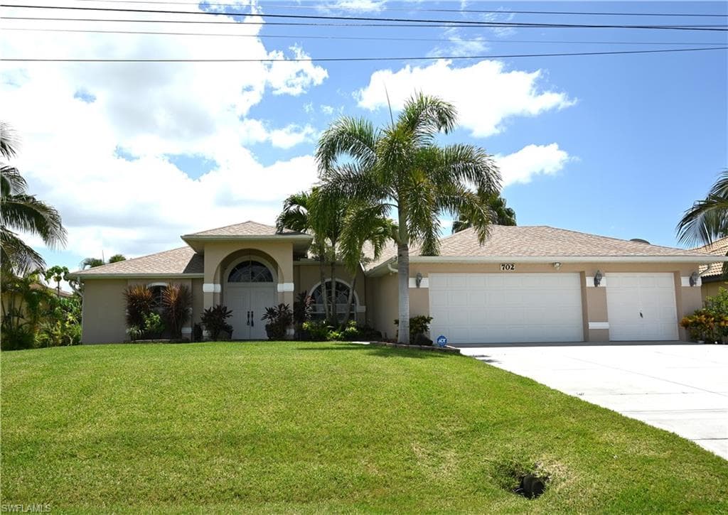702 NE 20th ST CAPE CORAL, FL 33909