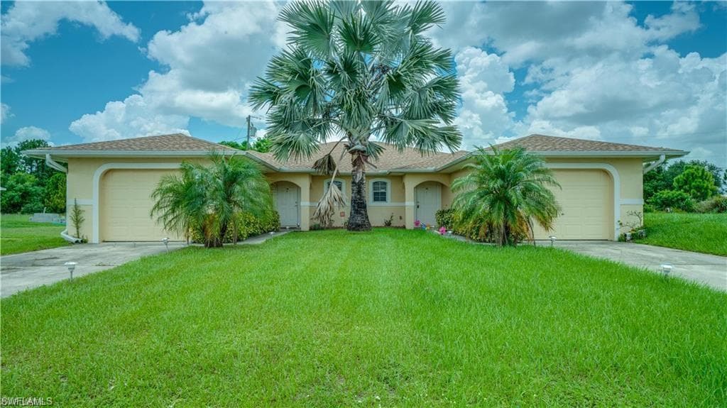 716/718 Jenna AVE S LEHIGH ACRES, FL 33973