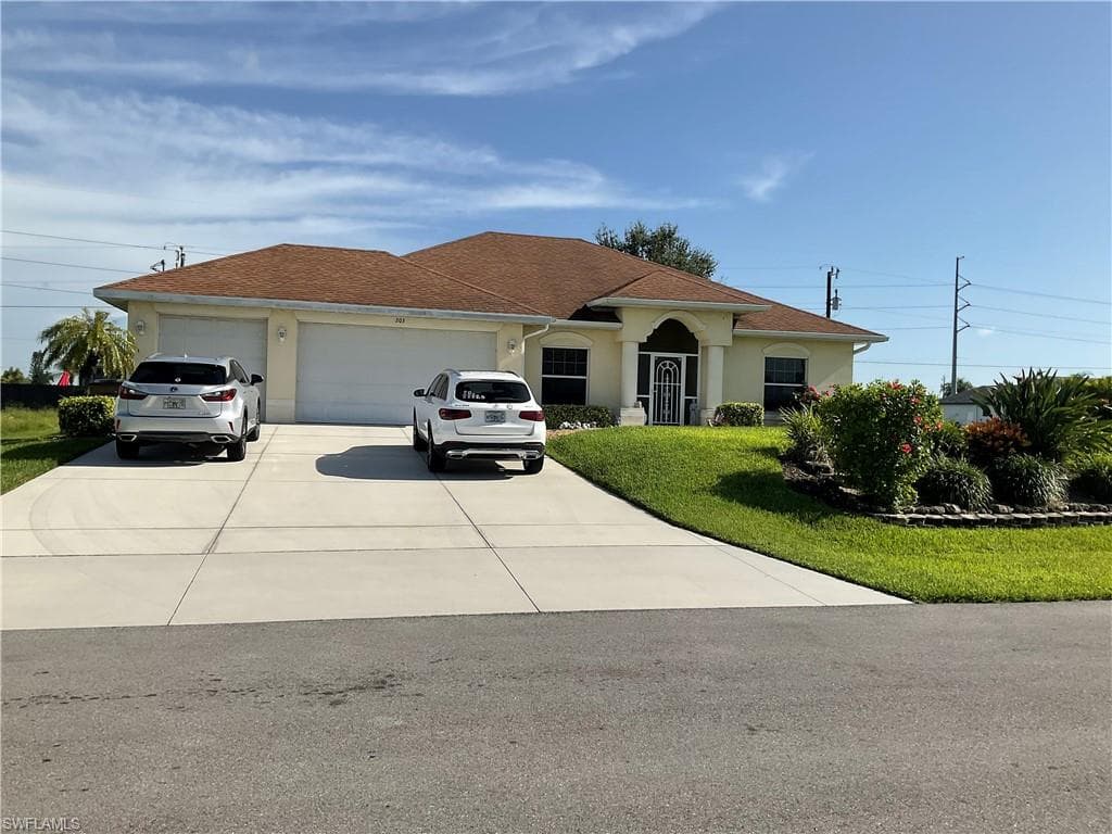 203 NW 7th TER CAPE CORAL, FL 33993