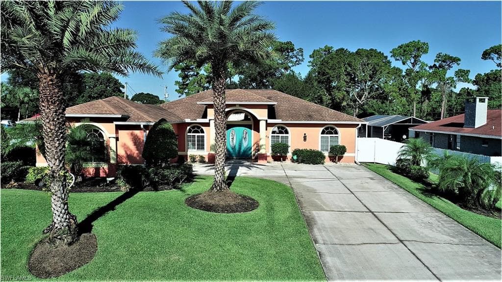 209 Greenwood AVE LEHIGH ACRES, FL 33936