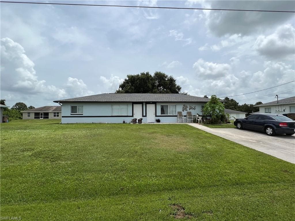129/131 Gordon AVE S LEHIGH ACRES, FL 33973