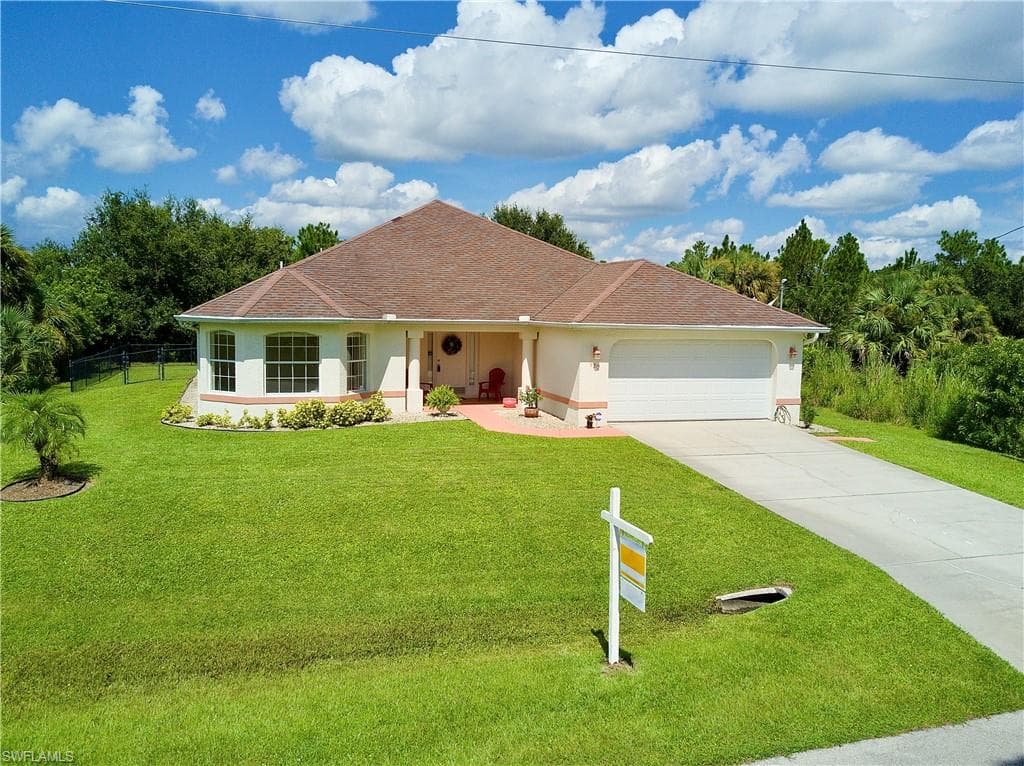 920 Oxford AVE S LEHIGH ACRES, FL 33974