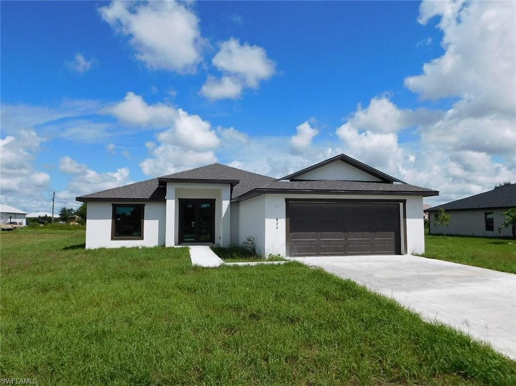 633 Carrillon AVE S LEHIGH ACRES, FL 33974