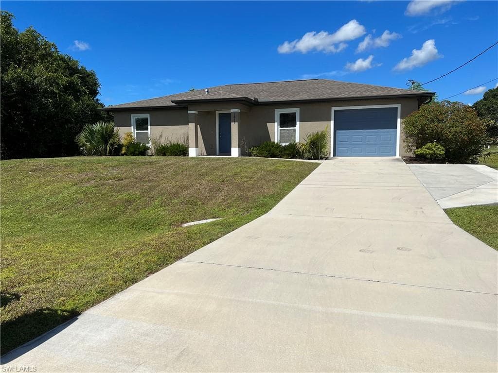 1015 Chaplin AVE LEHIGH ACRES, FL 33971